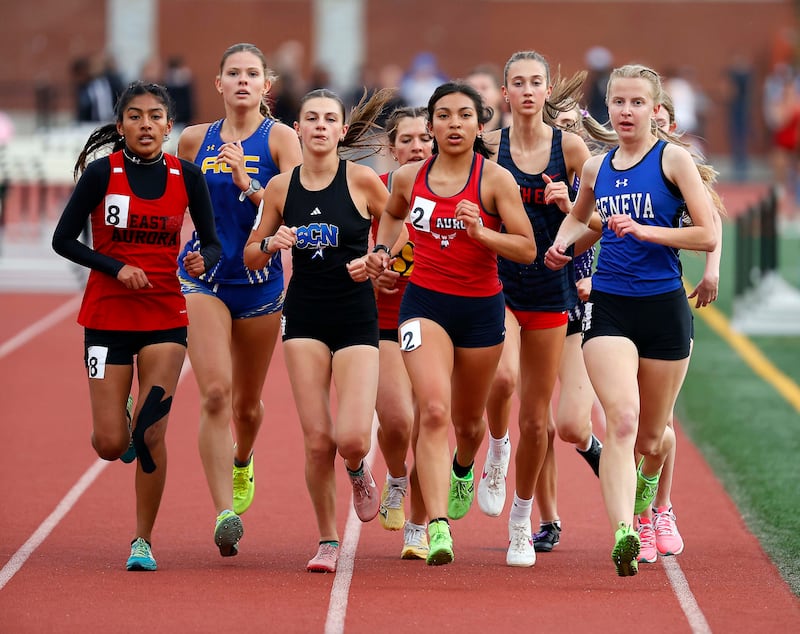 The girls 3200m during the Kane County girls track and field meet at East Aurora High School Friday, May 2, 2025 in Aurora Ill.