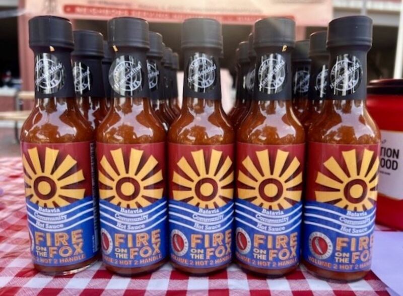 The second iteration of the Batavia community hot sauce, Fire on the Fox: 2 Hot 2 Handle, created by Gindo's Spice of Life in St. Charles using peppers grown and donated by community members in 2024.