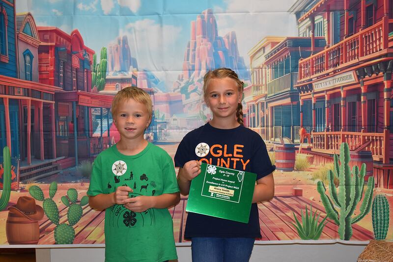 Alana Smith won the new Ogle County Project Honor Award. From left to right: Allan Smith and Alana Smith.