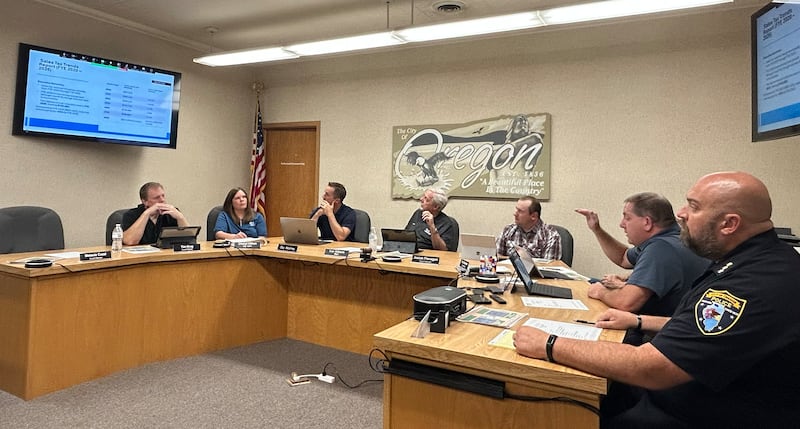 Oregon City Administrator Darin DeHaan (second from right) speaks at the City Council meeting on Tuesday, Sept. 23, 2024.
