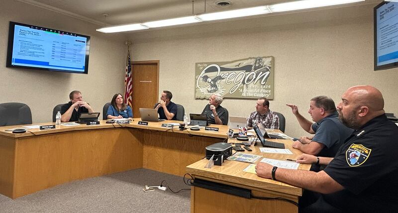 Oregon City Administrator Darin DeHaan (second from right) speaks at the City Council meeting on Tuesday, Sept. 23, 2024.