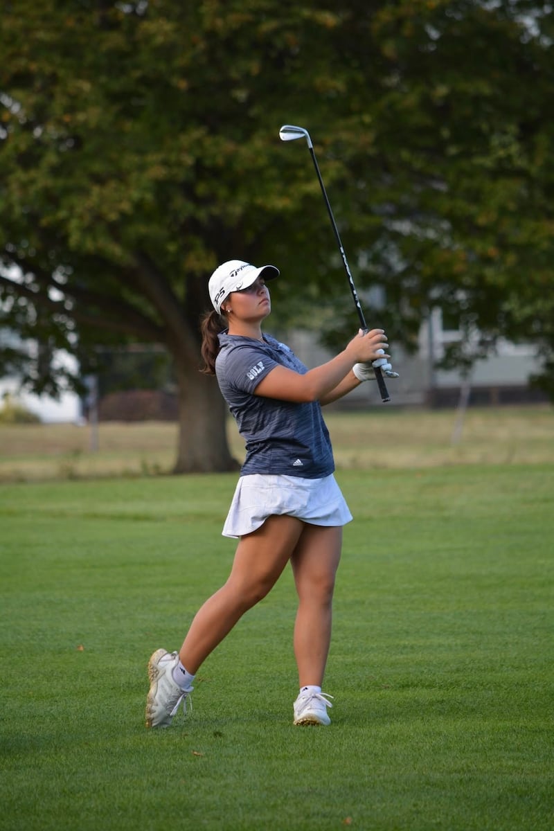 Downers Grove South senior Miah Wanserski follows the flight of her ball during the IHSA Class 2A state tournament at Hickory Point Golf Course in Forsyth.