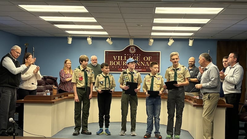 Mayor Jeff Keast stands with Scouts (from left) Isaac Rosenberger, Kaden Ramirez, Josiah Fish, Nehemiah Rosenberger, and Hudson Lacher during the Village of Bourbonnais Scout Day celebration.