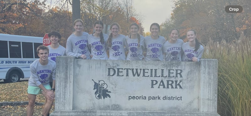 From left, Manteno runners Caden Reiter, Seth McHugh, Riley Powell, Olivia Zwirkowski, Klarke Goranson, Lyla Nevel, Sawyer Maveety, DeLanie Monroe and manager Isabelle Jackson at the cross country State Finals on Nov. 8, 2025.