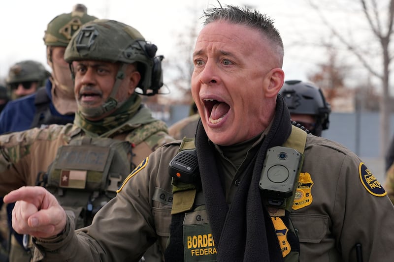U.S. Border Patrol Cmdr. Gregory Bovino shouts at protesters, Sunday, Jan. 11, 2026, in Minneapolis. (AP Photo/Jen Golbeck)