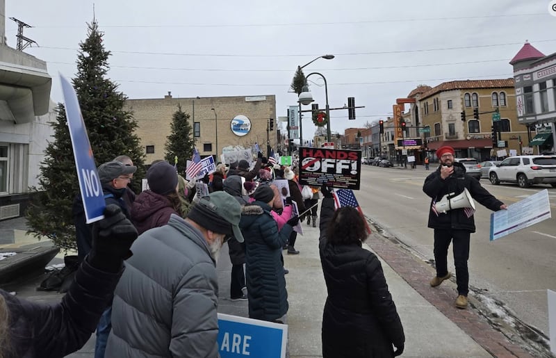 Community members rally in support of immigrants and against federal immigration raids in the community outside the St. Charles Municipal Building on Jan. 3, 2025.