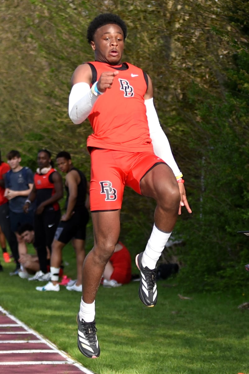 Bradley-Bourbonnais' Malachi Lee leaps during the long jump at the All-City track and field meet at Kankakee Monday, April 28, 2025.