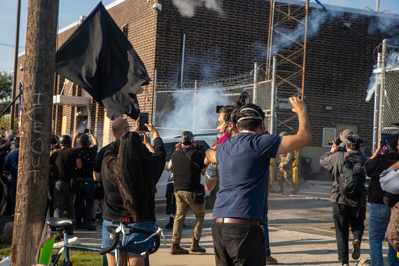 Protesters clash with Immigration and Customs Enforcement officers at the ICE facility in Broadview, Ill., Friday, Sept. 19, 2025. (Zubaer Khan  /Chicago Sun-Times via AP)