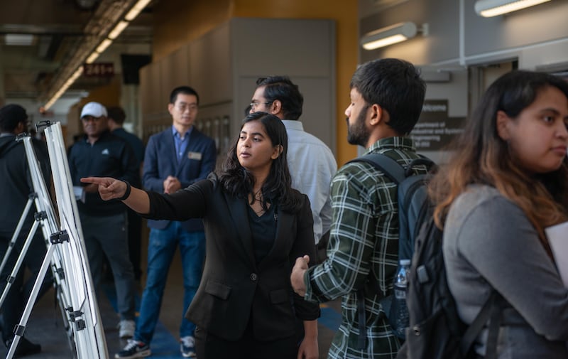 Angelica Sanyal, an NIU sophomore industrial and systems engineering major, discusses her research poster during the Innovation Showcase on Nov. 14, 2025. Sanyal received the Outstanding Freshman Award for Academic Achievement last year.