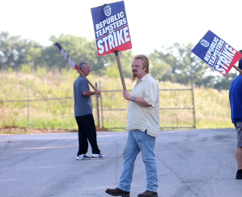 Tom Mitchell of Republic Services and Teamsters Local 179, pickets in front of the south entrance to Republic Services on Wednesday, July 2, 2025 in Ottawa. The strike involves 25 employees at Republic Services at the Otawa facility.
The action will disrupt waste collections for tens of thousands of residents throughout LaSalle County. Republic Teamsters are demanding a contract with improved wages, better benefits, and stronger labor protections. The Illinois strike comes after 450 Republic Teamsters in Boston went on strike on Tuesday. Hundreds of additional Teamsters across the country are having similar contract disputes with Republic.
