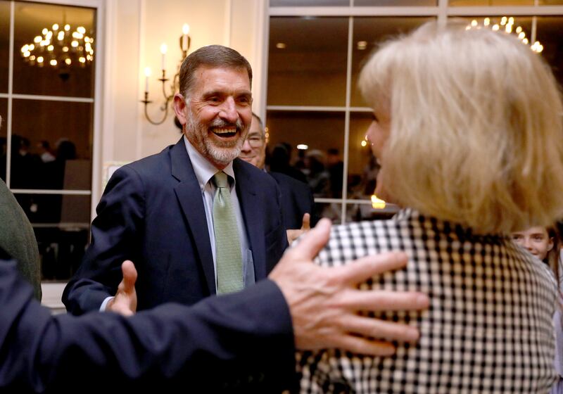 Charlie Murphy greets his wife, April, after being announced the winner of the 2025 Charlemagne Award during the Charlemagne Awards Soirée on Friday, May 2, 2025 at the Royal Fox Country Club in St. Charles.