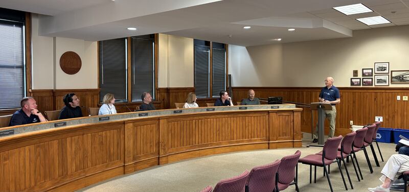 SunVest Regional Director of Project Development Bill Finch talks with Ottawa Plan Commission members about the proposed solar panel project off Canal Road and the ADM terminal in Ottawa.