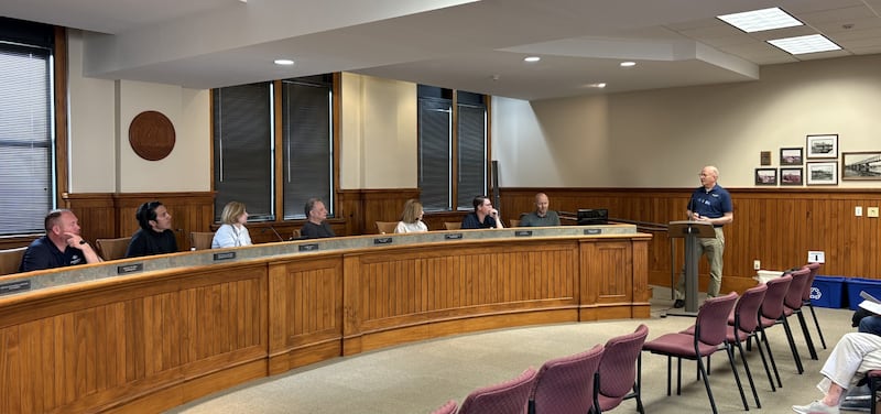 SunVest Regional Director of Project Development Bill Finch talks with Ottawa Plan Commission members about the proposed solar panel project off Canal Road and the ADM terminal in Ottawa.