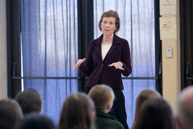 Illinois Supreme Court Justice Elizabeth Rochford answers questions from 7th grade students at St Patrick Catholic School in St Charles on Thursday, Dec 4, 2025.
