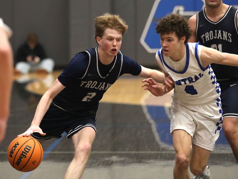 Cary-Grove's AJ Berndt tries to drive against Burlington Central's Ryan Carpenter during a Fox Valley Conference boys basketball game on Friday, February. 6, 2026, at Burlington Central High School.