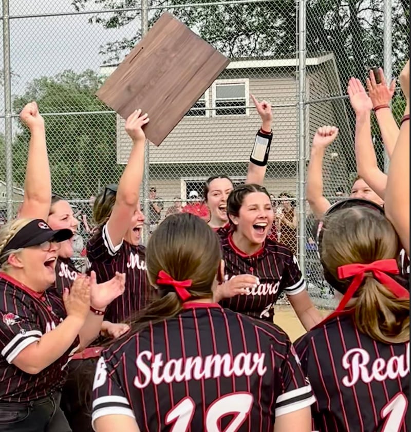 Members of the Henry-Senachwine softball team celebrate after beating West Central 2-1 in the Class 1A AlWood Sectional championship on Friday, May 30, 2024 in Alpha. It's the first sectional title for the Mallards.