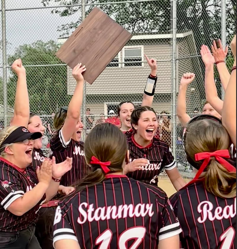 Members of the Henry-Senachwine softball team celebrate after beating West Central 2-1 in the Class 1A AlWood Sectional championship on Friday, May 30, 2024 in Alpha. It's the first sectional title for the Mallards.