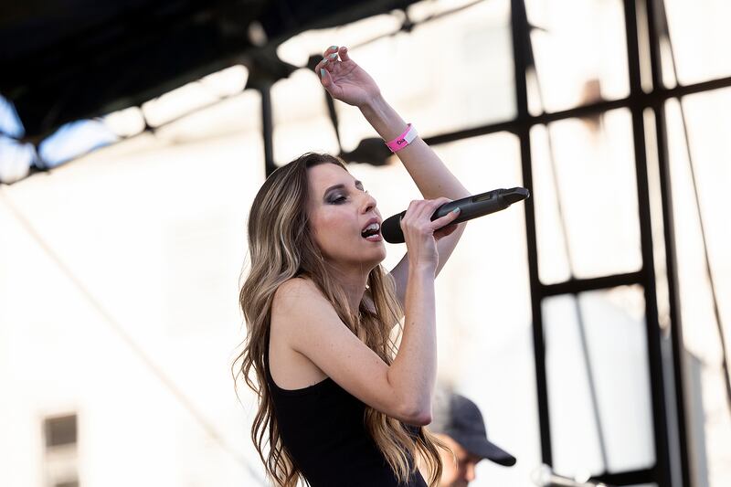 Desiree Nolan McCoy, singer of Desiree and the Wilde, performs Saturday, Sept. 6, 2025, at Dement Town Music Fest. The band was the second act to take the stage for the third annual festival.