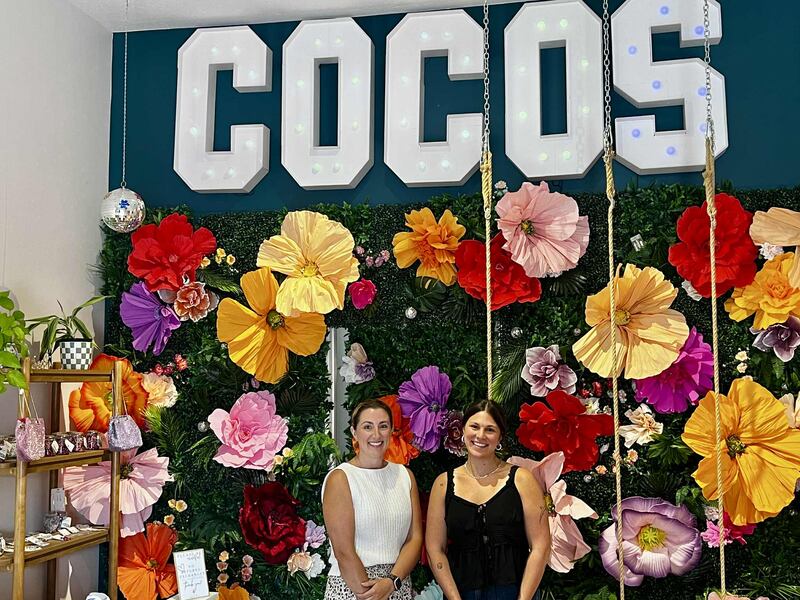 Owner Savana Egan and store manager Kelle Bliss stand ready to help customers at the grand opening of Coco's Prom & Homecoming on Aug. 1, 2025, in Sterling.