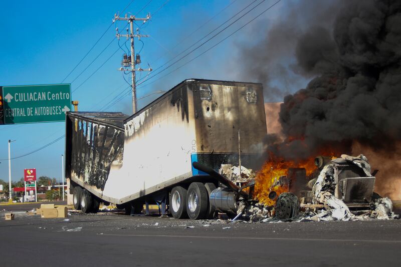 FILE - A truck burns on a street in Culiacan, Sinaloa state, Thursday, Jan. 5, 2023.  (AP Photo/Martin Urista, file)