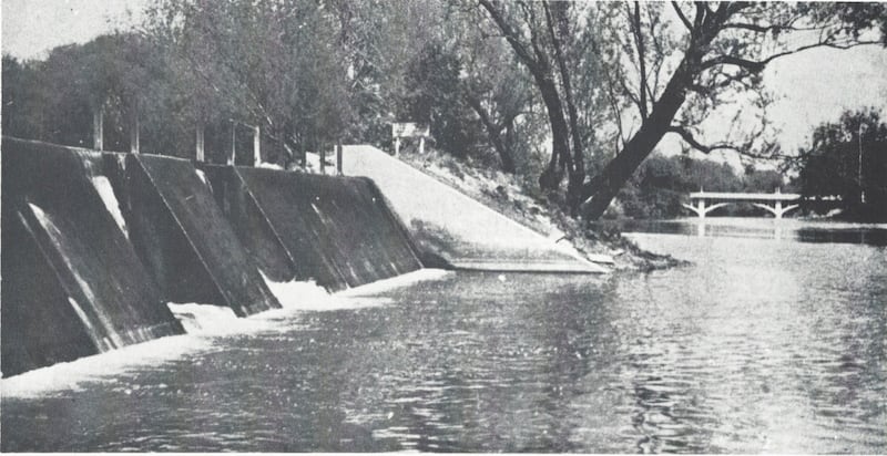 This photo shows part of the old State Fish Hatchery spillway on the north bank of the Fox River. In 1956 the property was purchased by the Yorkville-Bristol Sanitary District and is the site of their treatment plant. Despite all the new construction around the facility, part of the concrete structure is still visible today. (Record file photo)