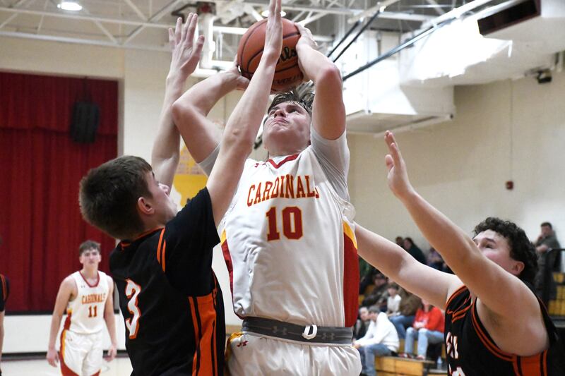 St. Anne's Grant Pomaranski goes up for a shot while contested by Gardner-South Wilmington's Cooper Biros during St. Anne's 52-45 victory over Gardner-South Wilmington on Tuesday, January 13, 2026.