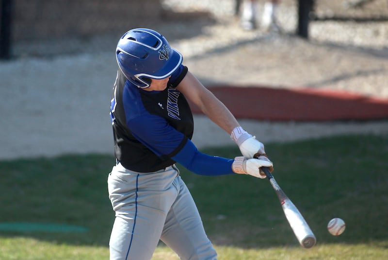 Geneva's Michael Toole hits the ball during a game against Wheaton Warrenville South on Monday April 14, 2025 in Wheaton.