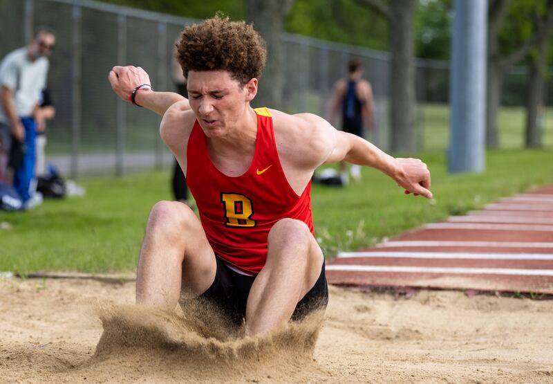 Batavia High School’s Mattisse Contreras participates in the long jump during the Dukane Conference Boys Track and Field Meet hosted by Lake Park High School in Roselle on Friday, May 16, 2025.