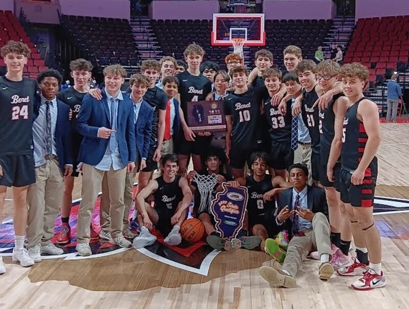 Benet celebrates a 58-50 victory over Quincy at the Class 4A Illinois State Super-Sectional on Monday.