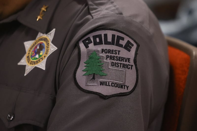 A member of the Will County Forest Preserve Police attends the Finance Committee for Forest Preserve District of Will County at the Will County Office Building on Thursday June 6, 2024 in Joliet.