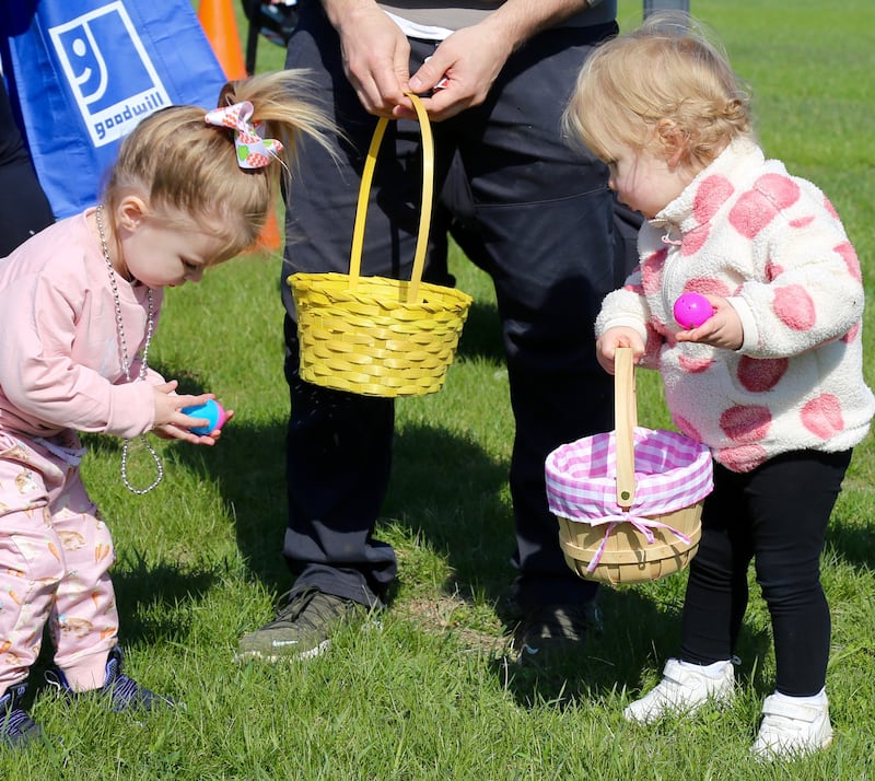 Kids in the 1-3 year old division put eggs in their baskets at the Elburn Lions Easter Egg Hunt on Saturday, April 12, 2025 in Elburn.