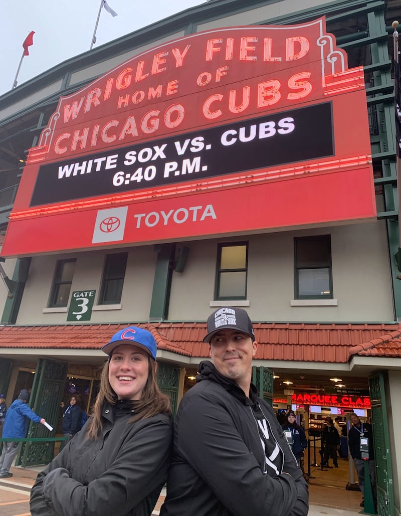 Despite their differing team allegiances, Cubs fan Bridgett Kolls of Carol Stream and her kidney donor, White Sox fan Thomas Alessio of Chicago, remain in touch. They’re pictured here at Wrigley Field in 2022.