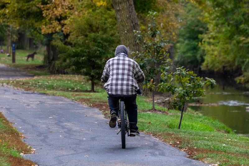 A cyclist enjoys the I&M Canal path in Lockport on Oct. 15, 2025.