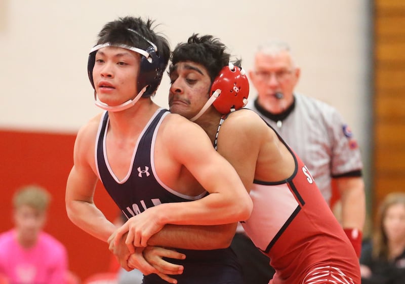 Streator's Ved Chaudhari (at right) maintains control of Lisle's Charles Wang during a meet Wednesday, Jan. 21, 2026, in Streator's Pops Dale Gymnasium.