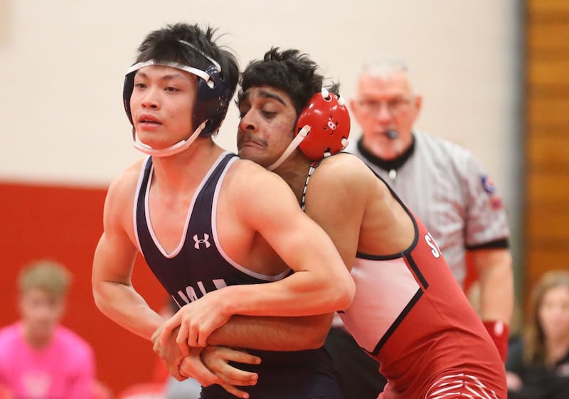 Streator's Ved Chaudhari (at right) maintains control of Lisle's Charles Wang during a meet Wednesday, Jan. 21, 2026, in Streator's Pops Dale Gymnasium.