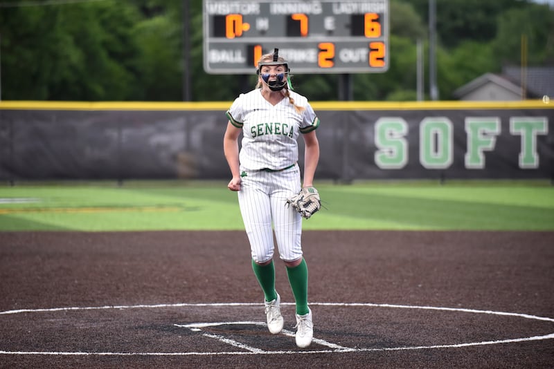 Seneca's Tessa Krull celebrates after recording her 11th strikeout of the game for the final out of the Fighting Irish's 6-0 win over Coal City in the IHSA Class 2A Seneca Sectional semifinals Tuesday, May 27, 2025.