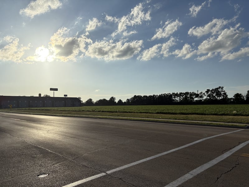 Open grassy space along Etna Road, the proposed site for a new self-storage facility as part of a larger development on Ottawa’s north side.