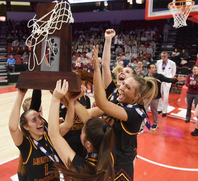 Montini players celebrate their 50-44 victory over St. Ignatius during the IHSA Class 3A girls state basketball championship game at CEFCU Arena on Saturday, March 8, 2025 in Normal.