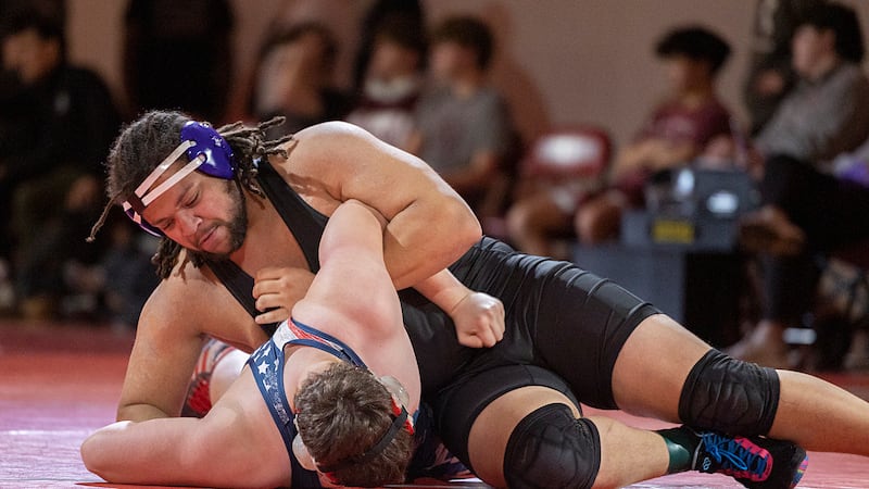 Dixon wrestling advances to state as a team after victory over Morrison