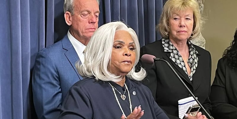 From left: Sen. Dale Fowler, Brenda Myers-Powell, and Sen. Julie Morrison show support for SB2323