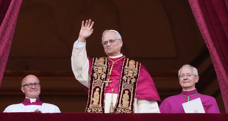 Cardinal Robert Prevost appears on the central loggia of St. Peter's Basilica after being chosen the 267th pontiff of the Roman Catholic Church, choosing the name of Pope Leo XIV, at the Vatican, Thursday, May 8, 2025.
