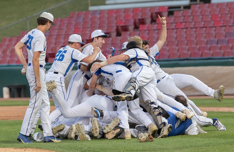 The Newman Comets celebrate their 5-1 win over Chicago Hope Monday, June 2, 2025, during the Class 2A Supersectional at Northwestern Medicine Field in Geneva.