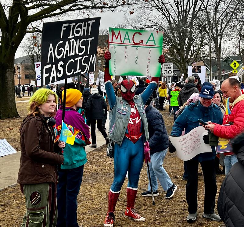 Drake Allen (Spiderman) protests the Trump administration's policies at Sterling's Grandon Civic Center on Friday, March 7, 2025.