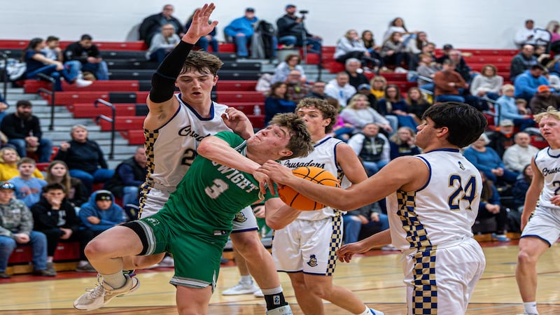 Photos: Close contest as Dwight takes down Marquette in boys basketball