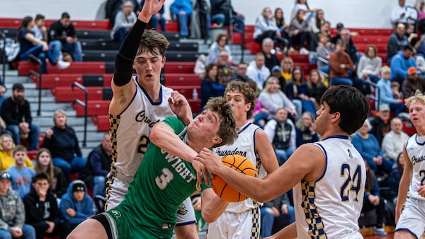 Photos: Close contest as Dwight takes down Marquette in boys basketball