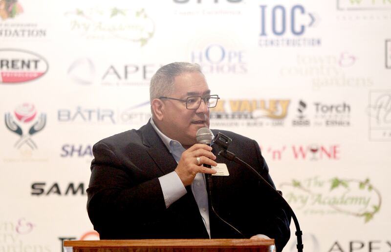 Jim Di Ciaula, executive director of CASA Kane County County, speaks during the annual Hands Around the Courthouse in honor of National Child Abuse Prevention Month on Thursday, April 10, 2025 at the Kane County Courthouse in Geneva.