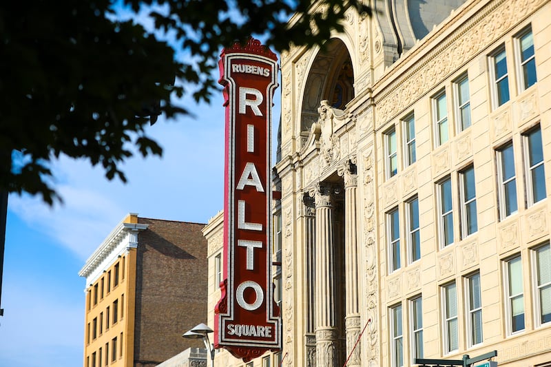 The sun sets over the Rialto Square Theatre in Joliet, Ill.