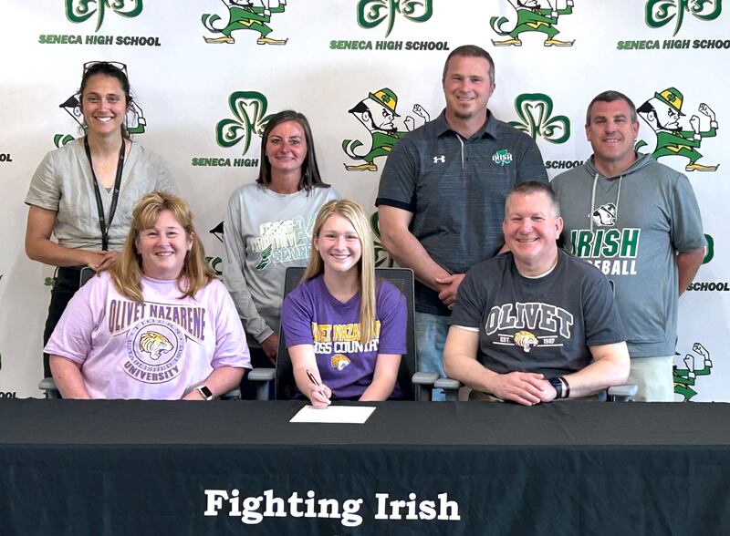 Seneca graduate and Times All-Area Girls Track and Field All-Area honoree Natalie Misener has committed to continue her education at Olivet Nazarene University in Bourbonnais and both her track and cross country careers at the NAIA level with the Tigers. At her signing ceremony were (left to right): in front – Donna Misener, Natalie Misener, Eric Misener; and in back – Eva Bruno, Kim Foster, Terry Maxwell and Ted O'Boyle.
