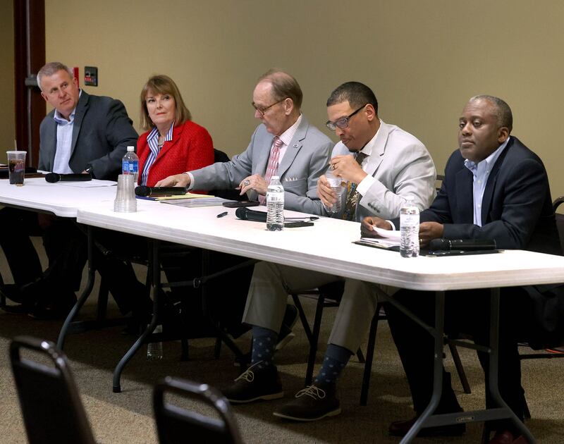 Current DeKalb Mayor and candidate for re-election Cohen Barnes (L-R) Barbara Larson, 2nd Ward Alderwoman and candidate for re-election, Michael Embrey, candidate for 2nd Ward Alderman, John Walker, current 7th Ward Alderman and candidate for mayor, and Kouame Sanan, candidate for mayor, prepare for questions Wednesday, Feb. 19, 2025, during the DeKalb Area Rental Association and DeKalb Area Builders Association Candidate Night at Faranda's Banquet Center in DeKalb.