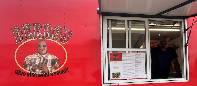 Owner Tommie Wallace stands ready to greet customers at his food truck, Deebo's, located in the parking lot of the 301 North convenience store at 301 N. Galena Ave. in Dixon.